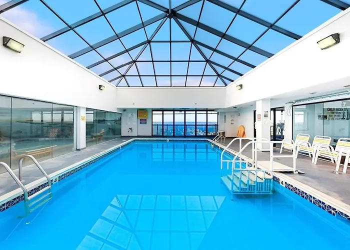 Cozy Beachfront With Balcony Views Pools & Game Holiday home *